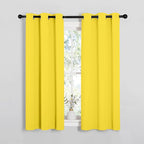 NICETOWN Window Curtain Panels, Thermal Insulated Solid Grommet Draperies/Drapes for Basement (Bright Yellow, 1 Pair, 34 by 54-inch)