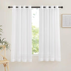 NICETOWN Sheer Curtain Panels Grommet - Ivory Voile Sheer Window Curtains for Bedroom/Living Room, 2 Pieces, 54 Wide x 63-inch Length