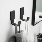 BESy Brass Clothes Hook Single Towel Hook for Bathroom Kitchen Garage Square Style Robe Hooks Coat and Hat Hook, Self Adhesive with Glue or Wall Mounted with Screws, Two Packs, Matte Black