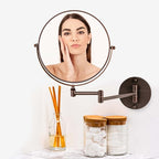 OVENTE 9" Wall Mounted Makeup Mirror with 1X/7X Magnification, Double Sided Magnifying Round Bathroom Vanity Mirror, 360° Swivel Design, Extendable and Folding Arm, Antique Bronze MNLFW90ABZ1X7X