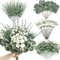 Serwalin 100 Pcs 7 Kinds Mixed Artificial Eucalyptus Leaves Stems Bulk with Flowers Faux Silver Dollar Eucalyptus Stmes Greenery Branches for Wedding Floral Arrangement Centerpieces Home Decor