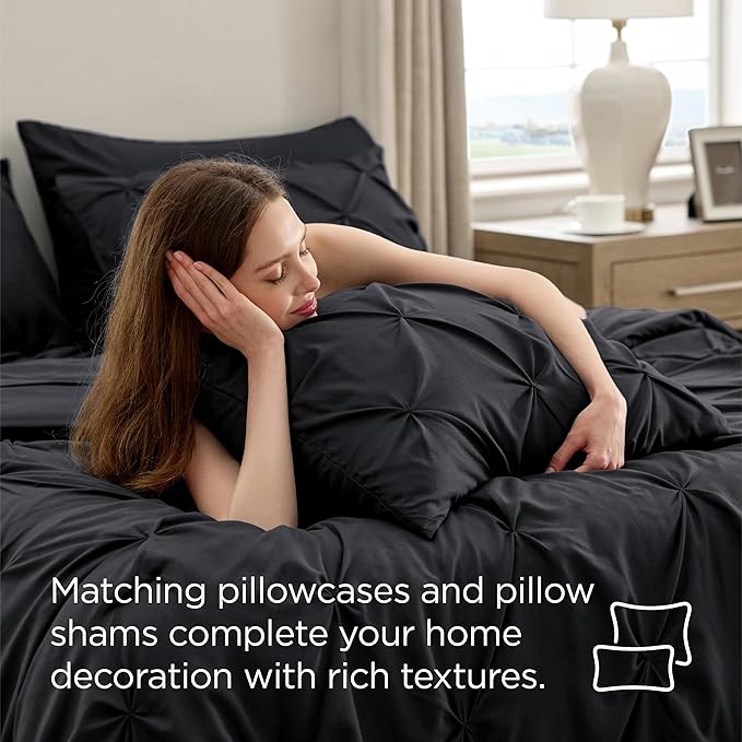 Bedsure Oversized King Comforter Set Black - Bed in a Bag Bedding Set 7 Pieces, GentleSoft™ Pintuck Bed Set Gift for Family, Pinch Pleat Black Comforter with Sheets, Pillowcases & Shams