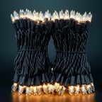 YULETIME Clear Christmas Lights with Black Wire, Pack of 2 Strands 33 Ft 100 Count UL Certified Incandescent Mini String Lights (Clear - Black Wire)
