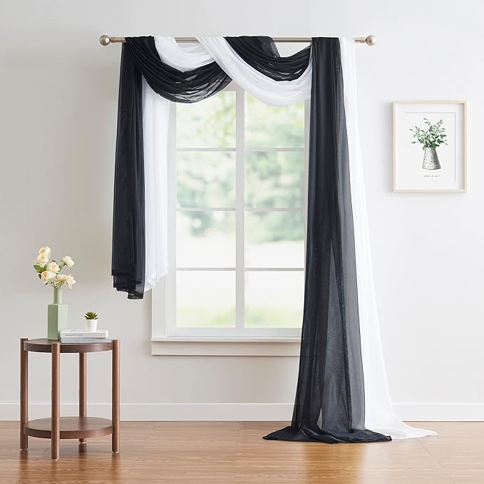 Warm Home Designs 18 Feet Long Sheer Black Window Scarf. These Long Length Valance Window Scarves are 54 X 216 Inches in Size. Great as Bed Canopy or Wedding Arch Draping Fabric. AM Black 216"