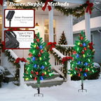 Lewondr Set of 2 Prelit Pathway Christmas Trees, 47.24" Outdoor Xmas Tree with 50 LED Strawberry Lights, Pine Cones Red Green Fruits, Solar and Type-C Powered Xmas Decor with Small Bells for Yard Home
