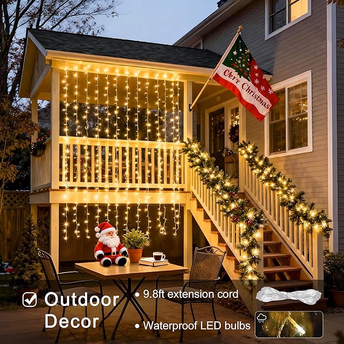 JMEXSUSS 300 LED Remote Control Christmas Curtain Lights, Plug in Fairy Curtain Lights Outdoor, Window Wall Hanging String Lights for Bedroom Backdrop Wedding Party Indoor Patio Xmas Decor, Warm White
