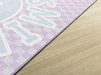 Flagship Carpets Schoolgirl Style Smiley on Lavender Checkerboard Educational Area Rug for Kids Room Seating Décor, Children's Classroom, Play Carpet for Teaching and Playroom, 5' x 7'6", Purple